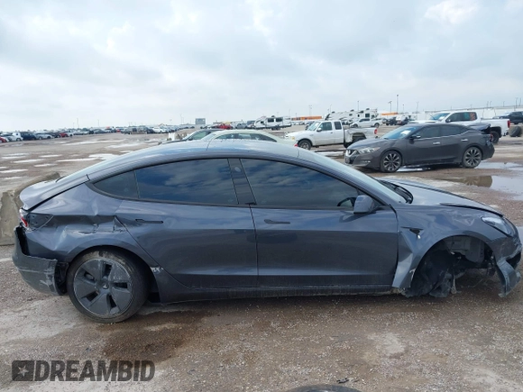 2023 Tesla Model 3 with VIN 5YJ3E1EA5PF676316, listed as a IAAI auction lot 42384765 with 33,715 mi miles and . Bid and sale history available at DreamBid. Image 13.