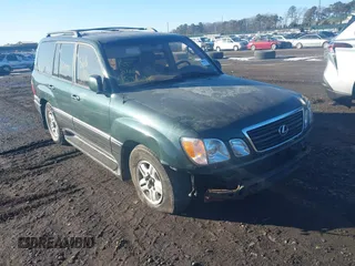 1999 Lexus LX 470 with VIN JT6HT00W9X0031151, listed as a IAAI auction lot 41436144 with Not Provided miles and . Bid and sale history available at DreamBid. Image 1.