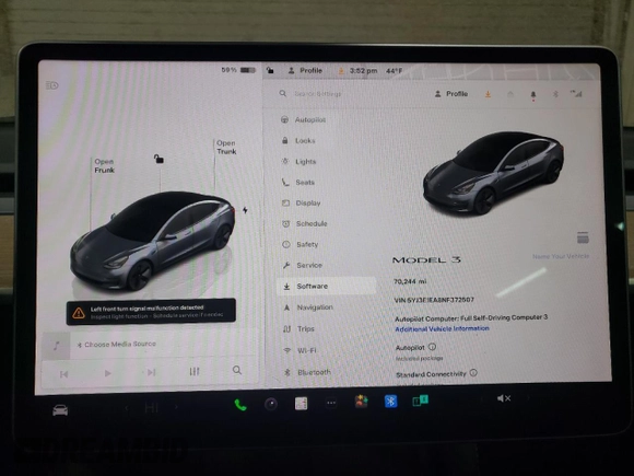 2022 Tesla Model 3 with VIN 5YJ3E1EA8NF372507, listed as a Copart auction lot 52572705 with 70,244 mi miles and Salvage Title. Bid and sale history available at DreamBid. Image 9.