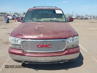 2001 GMC Yukon SLT with VIN 1GKEK13V81J100005, listed as a IAAI auction lot 42090494 with 276,042 mi miles. Bid and sale history available at carsss.com. Image 6.