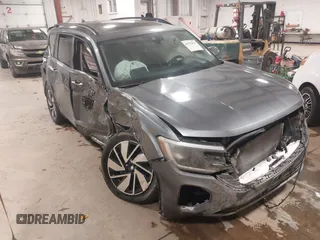 2024 Volkswagen Atlas SE z VIN 1V2KR2CA4RC559169, wystawiony jako IAAI lot #41572821 z przebiegiem 25 998 mil mil oraz . Historia ofert i sprzedaży dostępna na DreamBid. Obrazek 1.