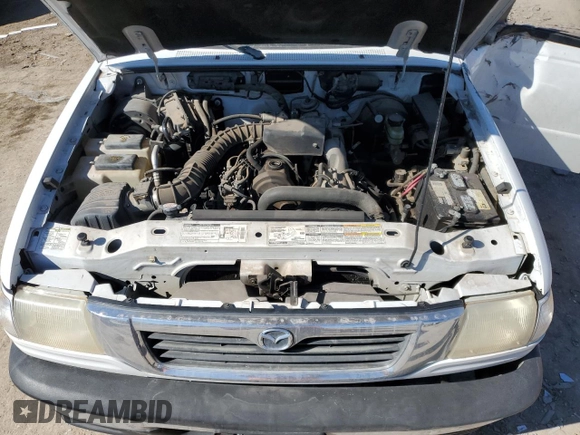 1999 Mazda B-Series Truck SX z VIN 4F4YR12CXXTM23416, wystawiony jako Copart lot #46078195 z przebiegiem 221 079 mil mil oraz Szkoda całkowita • Salvage title. Historia ofert i sprzedaży dostępna na DreamBid. Obrazek 11.
