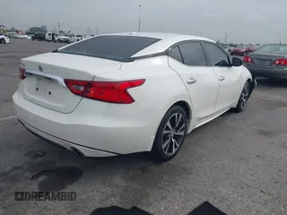 2016 Nissan Maxima SL with VIN 1N4AA6AP3GC448957, listed as a IAAI auction lot 41734717 with 128,687 mi miles and . Bid and sale history available at DreamBid. Image 4.