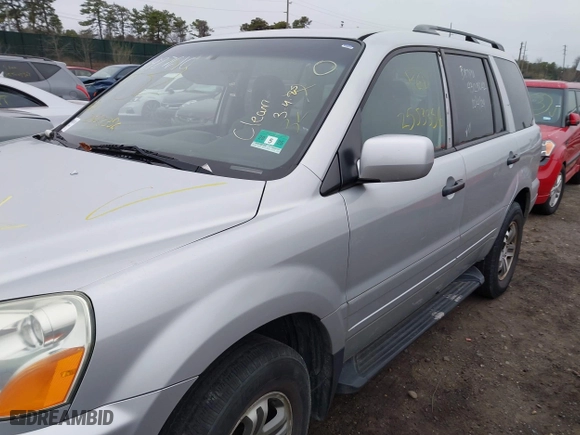 2004 Honda Pilot EX with VIN 2HKYF18494H525047, listed as a IAAI auction lot 41927610 with 999,999 mi miles. Bid and sale history available at carsss.com. Image 6.