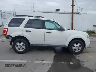 2011 Ford Escape XLT with VIN 1FMCU0D79BKA38578, listed as a IAAI auction lot 41895971 with 223,689 mi miles. Bid and sale history available at carsss.com. Image 14.