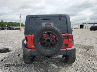 2015 Jeep Wrangler Unlimited Sport with VIN 1C4BJWDG6FL568082, listed as a Copart auction lot 58242945 with 114,637 mi miles and Salvage title. Bid and sale history available at DreamBid. Image 6.