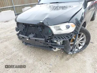 2018 Dodge Durango SXT with VIN 1C4RDJAG1JC218378, listed as a IAAI auction lot 41955407 with 71,022 mi miles and . Bid and sale history available at DreamBid. Image 6.