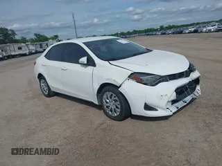 2019 Toyota Corolla L z VIN 5YFBURHE0KP913271, wystawiony jako IAAI lot #41744722 z przebiegiem 98 128 mil mil oraz . Historia ofert i sprzedaży dostępna na DreamBid. Obrazek 1.