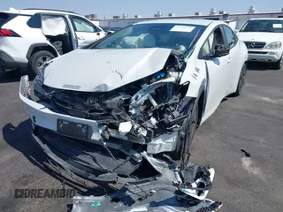 2023 Toyota Prius LE with VIN JTDACAAU7P3013923, listed as a IAAI auction lot 42600973 with 33,958 mi miles and . Bid and sale history available at DreamBid. Image 6.