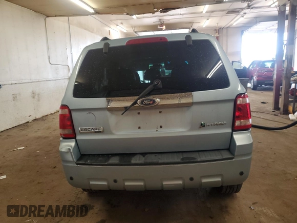 2009 Ford Escape Hybrid with VIN 1FMCU49399KA29841, listed as a Copart auction lot 64803435 with 131,289 mi miles and Salvage title. Bid and sale history available at DreamBid. Image 6.