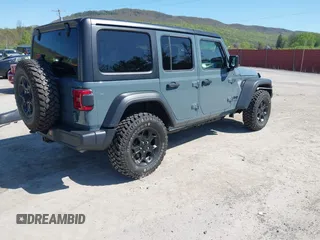 2024 Jeep Wrangler Sport S with VIN 1C4PJXDN2RW351741, listed as a IAAI auction lot 42122651 with 4,241 mi miles and . Bid and sale history available at DreamBid. Image 4.