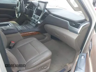 2015 Chevrolet Suburban LTZ with VIN 1GNSCKKC5FR740352, listed as a IAAI auction lot 39075234 with 112,945 mi miles and . Bid and sale history available at DreamBid. Image 5.
