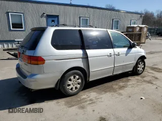 2004 Honda Odyssey EX-L with VIN 5FNRL18994B117140, listed as a Copart auction lot 49677635 with 247,237 mi miles and Salvage Title. Bid and sale history available at DreamBid. Image 3.