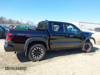 2024 Nissan Frontier Pro-4X with VIN 1N6ED1EK3RN654112, listed as a IAAI auction lot 41686345 with 14,893 mi miles and . Bid and sale history available at DreamBid. Image 14.