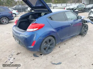 2017 Hyundai Veloster with VIN KMHTC6AD7HU318304, listed as a IAAI auction lot 41726043 with 63,050 mi miles. Bid and sale history available at carsss.com. Image 4.