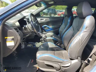 2016 Hyundai Veloster Turbo with VIN KMHTC6AE1GU251058, listed as a Copart auction lot 54238655 with 105,572 mi miles and Clean Title. Bid and sale history available at carsss.com. Image 7.