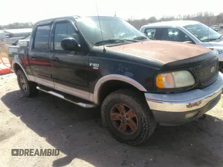 2002 Ford F-150 XLT with VIN 1FTRW08L12KC44008, listed as a IAAI auction lot 41811120 with 306,235 mi miles. Bid and sale history available at carsss.com. Image 1.