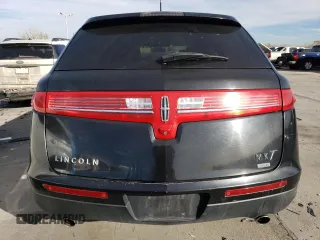 2015 Lincoln MKT with VIN 2LMHJ5NK0FBL03357, listed as a Copart auction lot 87189024 with 228,046 mi miles and Salvage Title. Bid and sale history available at carsss.com. Image 6.