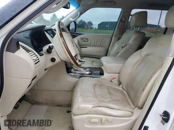 2012 Infiniti QX56 7-passenger with VIN JN8AZ2NF8C9517540, listed as a Copart auction lot 75046604 with 213,468 mi miles and Salvage Title. Bid and sale history available at carsss.com. Image 7.