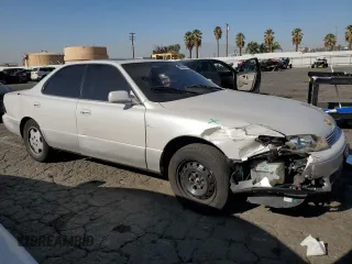 1994 Lexus ES 300 с VIN JT8GK13T1R0051202, выставлен на аукционе Copart как лот 83668264 с пробегом 165 148 миль миль и Списание • Salvage title. История ставок и продаж доступна на DreamBid. Изображение 4.
