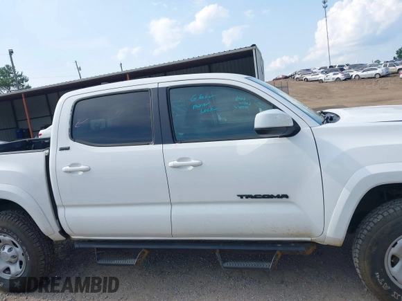 2017 Toyota Tacoma SR5 with VIN 3TMCZ5AN1HM063580, listed as a IAAI auction lot 42421660 with 95,543 mi miles and . Bid and sale history available at DreamBid. Image 14.