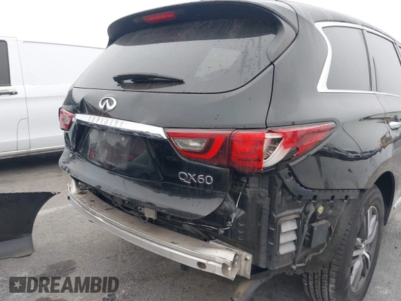2019 Infiniti QX60 LUXE with VIN 5N1DL0MN7KC500202, listed as a IAAI auction lot 41229623 with 103,626 mi miles. Bid and sale history available at carsss.com. Image 6.