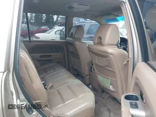 2006 Honda Pilot EX-L with VIN 2HKYF18706H529579, listed as a IAAI auction lot 41861069 with 222,641 mi miles and . Bid and sale history available at DreamBid. Image 8.