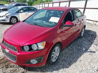 2012 Chevrolet Sonic LT with VIN 1G1JC5SH8C4222013, listed as a IAAI auction lot 42150220 with 76,706 mi miles and . Bid and sale history available at DreamBid. Image 2.