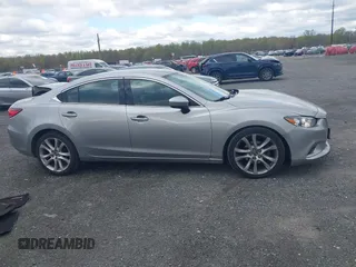 2014 Mazda 6 i Touring with VIN JM1GJ1V64E1147549, listed as a IAAI auction lot 42041025 with 124,400 mi miles and . Bid and sale history available at DreamBid. Image 13.