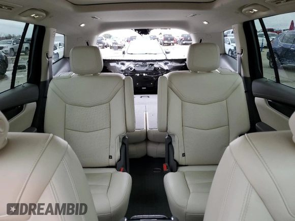 2021 Cadillac XT6 Premium Luxury z VIN 1GYKPCRS6MZ207546, wystawiony jako Copart lot #85995814 z przebiegiem 30 885 mil mil oraz Czysty tytuł • Clean title. Historia ofert i sprzedaży dostępna na DreamBid. Obrazek 10.