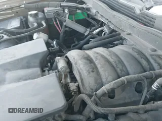 2014 Chevrolet Silverado 1500 LT z VIN 1GCVKREHXEZ305642, wystawiony jako IAAI lot #41356695 z przebiegiem 119 309 mil mil oraz . Historia ofert i sprzedaży dostępna na DreamBid. Obrazek 19.