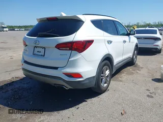 2018 Hyundai Santa Fe Sport 2.4L with VIN 5XYZU3LBXJG522477, listed as a IAAI auction lot 41981849 with 64,964 mi miles. Bid and sale history available at carsss.com. Image 4.