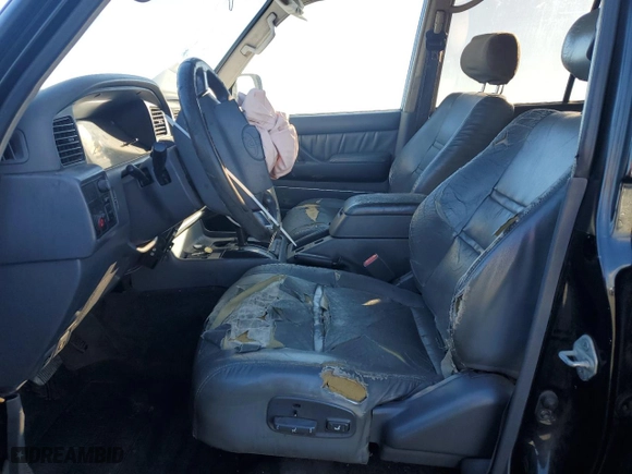 1996 Toyota Land Cruiser with VIN JT3HJ85J4T0136821, listed as a Copart auction lot 46988905 with 311,561 mi miles and Salvage Title. Bid and sale history available at carsss.com. Image 7.
