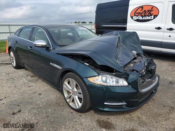 2014 Jaguar XJ with VIN SAJWJ2GD4E8V70170, listed as a Copart auction lot 69662054 with 121,188 mi miles and Non Repairable. Bid and sale history available at carsss.com. Image 4.
