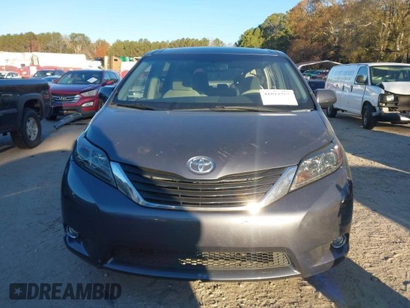 2011 Toyota Sienna LE AAS with VIN 5TDKK3DC2BS070656, listed as a IAAI auction lot 41034261 with 259,239 mi miles. Bid and sale history available at carsss.com. Image 12.