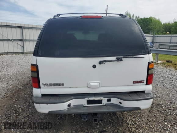 2002 GMC Yukon SLT z VIN 1GKEC13Z72R130454, wystawiony jako Copart lot #53845705 z przebiegiem 237 483 mil mil oraz Szkoda całkowita • Salvage title. Historia ofert i sprzedaży dostępna na DreamBid. Obrazek 6.