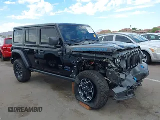2022 Jeep Wrangler Unlimited Rubicon with VIN 1C4JJXR64NW256714, listed as a IAAI auction lot 42769010 with 35,291 mi miles and . Bid and sale history available at DreamBid. Image 1.
