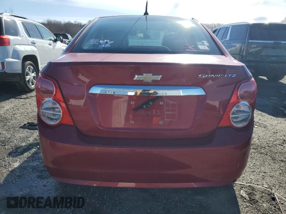 2012 Chevrolet Sonic LTZ z VIN 1G1JE5SHXC4126894, wystawiony jako Copart lot #45186475 z przebiegiem 76 461 mil mil oraz Czysty tytuł • Clean title. Historia ofert i sprzedaży dostępna na DreamBid. Obrazek 6.