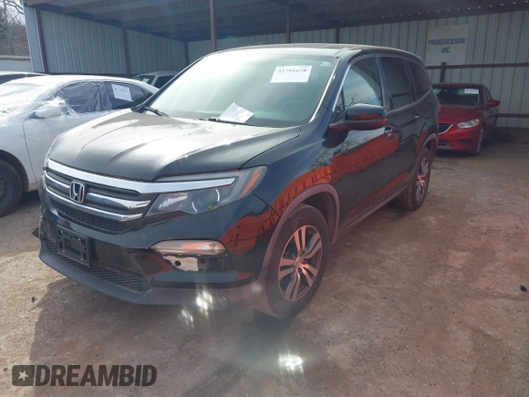 2017 Honda Pilot EX-L with VIN 5FNYF5H5XHB005735, listed as a IAAI auction lot 41791678 with 131,480 mi miles. Bid and sale history available at carsss.com. Image 18.