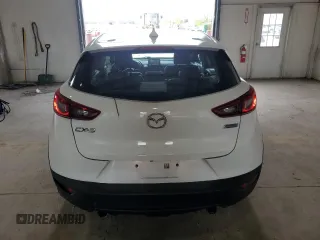 2016 Mazda CX-3 Touring z VIN JM1DKDC71G0127880, wystawiony jako Copart lot #52938385 z przebiegiem 73 860 mil mil oraz Szkody całkowita. Historia ofert i sprzedaży dostępna na DreamBid. Obrazek 6.