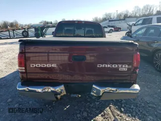 2003 Dodge Dakota SLT with VIN 1D7HL42N23S226033, listed as a Copart auction lot 83297194 with 0 mi miles and Salvage Title. Bid and sale history available at carsss.com. Image 6.