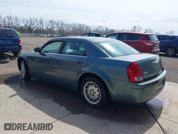 2005 Chrysler 300 with VIN 2C3JA43R45H616682, listed as a IAAI auction lot 41853835 with 158,464 mi miles. Bid and sale history available at carsss.com. Image 3.