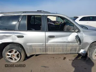 2004 GMC Envoy SLT with VIN 1GKDT13S742133932, listed as a IAAI auction lot 41598339 with 168,651 mi miles and . Bid and sale history available at DreamBid. Image 13.