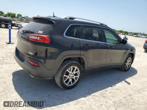 2016 Jeep Cherokee Altitude with VIN 1C4PJLCS0GW171848, listed as a Copart auction lot 52943535 with 141,686 mi miles and Clean Title. Bid and sale history available at carsss.com. Image 3.
