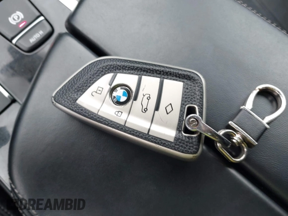 2018 BMW 5 Series 540i xDrive with VIN WBAJE7C59JWC55346, listed as a IAAI auction lot 42300109 with 107,868 mi miles and . Bid and sale history available at DreamBid. Image 11.