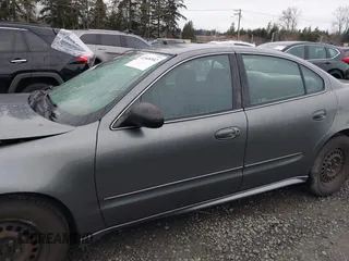 2004 Pontiac Grand Am SE with VIN 1G2NE52F94M530881, listed as a IAAI auction lot 41648302 with 116,540 mi miles. Bid and sale history available at carsss.com. Image 15.