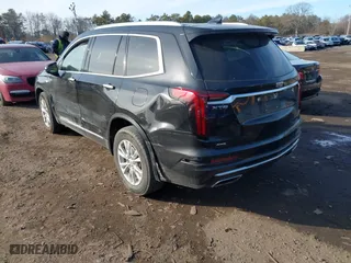 2023 Cadillac XT6 Luxury with VIN 1GYKPBR41PZ136918, listed as a IAAI auction lot 41417724 with 57,949 mi miles. Bid and sale history available at carsss.com. Image 3.