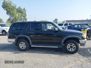 1998 Toyota 4Runner SR5 z VIN JT3GN86R0W0060376, wystawiony jako IAAI lot #42465641 z przebiegiem 321 550 mil mil oraz . Historia ofert i sprzedaży dostępna na DreamBid. Obrazek 13.