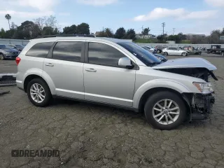 2014 Dodge Journey SXT with VIN 3C4PDCBG5ET227189, listed as a Copart auction lot 88994355 with 166,989 mi miles and Salvage Title. Bid and sale history available at carsss.com. Image 4.