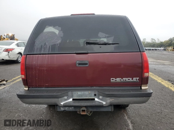 1999 Chevrolet Suburban with VIN 1GNFK16R7XJ402741, listed as a Copart auction lot 73283404 with 143,943 mi miles and Salvage Title. Bid and sale history available at carsss.com. Image 6.